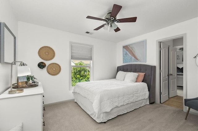 600 SW Gentry Ln, Lees Summit, MO 64081 - bedroom featuring light colored carpet and a ceiling fan