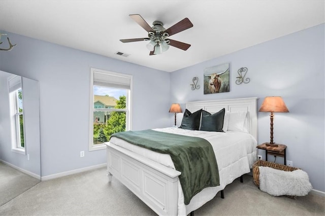 600 SW Gentry Ln, Lees Summit, MO 64081 - bedroom featuring light carpet and ceiling fan