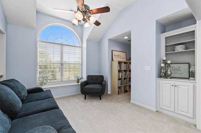 600 SW Gentry Ln, Lees Summit, MO 64081 - living area featuring plenty of natural light, vaulted ceiling, light carpet, and a ceiling fan