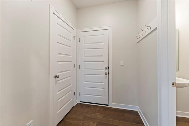 1913 SW Hightown Dr, Lees Summit, MO 64082 - doorway to outside with dark wood-style floors and baseboards