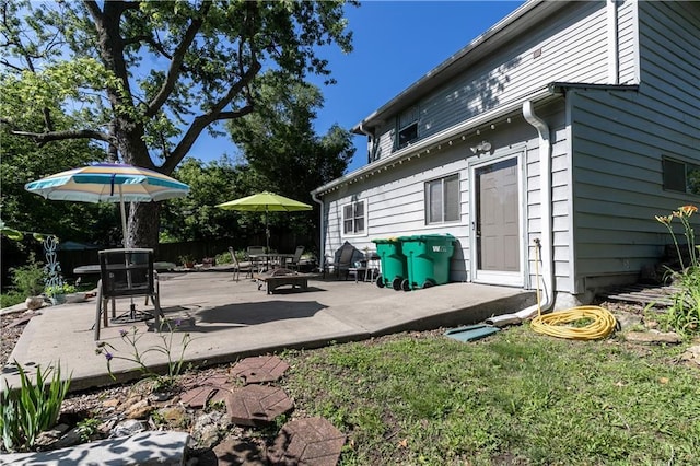 421 N Nettleton Ave, Bonner Springs, KS 66012 - view of patio / terrace featuring a fire pit
