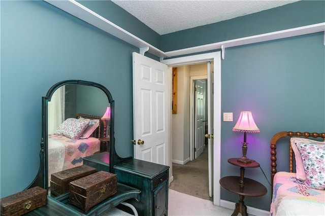 421 N Nettleton Ave, Bonner Springs, KS 66012 - carpeted bedroom featuring a textured ceiling