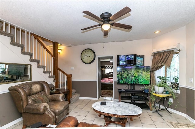 421 N Nettleton Ave, Bonner Springs, KS 66012 - living room featuring stairs, ceiling fan, tile patterned flooring, a textured ceiling, and recessed lighting