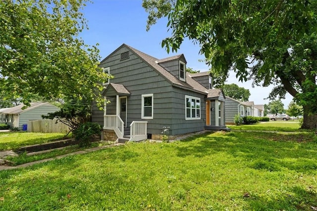 13623 W 95th St, Lenexa, KS 66215 - rear view of property featuring a lawn