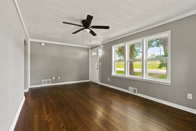 13623 W 95th St, Lenexa, KS 66215 - spare room with wood finished floors, ceiling fan, arched walkways, and crown molding