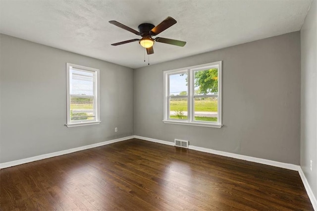 13623 W 95th St, Lenexa, KS 66215 - unfurnished room with wood finished floors and a ceiling fan
