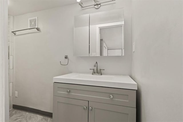 13623 W 95th St, Lenexa, KS 66215 - bathroom featuring vanity and marble finish floors