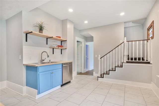 3521 Windsor Ave, Kansas City, MO 64123 - kitchen featuring a sink, dishwasher, light marble finish flooring, open shelves, and recessed lighting