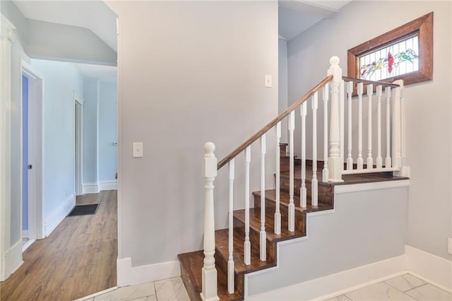 3521 Windsor Ave, Kansas City, MO 64123 - stairs with marble finish flooring and baseboards