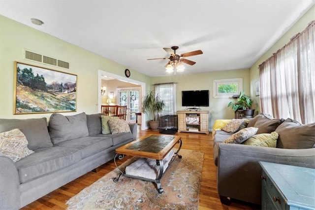 115 Adkins Rd, Glenaire, MO 64068 - living room with a ceiling fan and wood finished floors