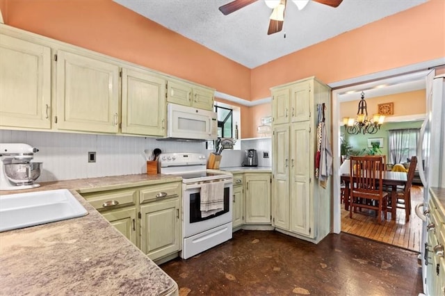 115 Adkins Rd, Glenaire, MO 64068 - kitchen with white appliances, a ceiling fan, a chandelier, light countertops, and concrete flooring