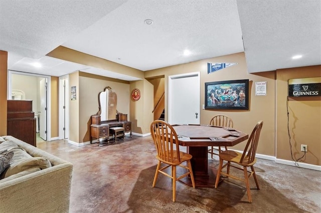 115 Adkins Rd, Glenaire, MO 64068 - dining room with a textured ceiling, finished concrete floors, recessed lighting, and stairs