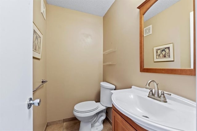 115 Adkins Rd, Glenaire, MO 64068 - bathroom featuring vanity, tile patterned floors, and a textured ceiling