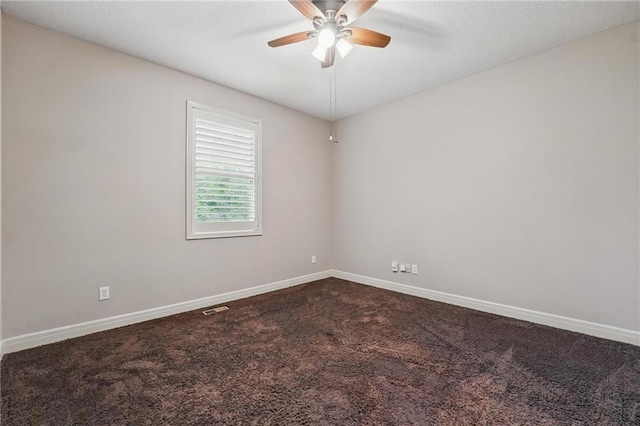 9332 W 158th St, Overland Park, KS 66221 - empty room featuring a ceiling fan and dark carpet