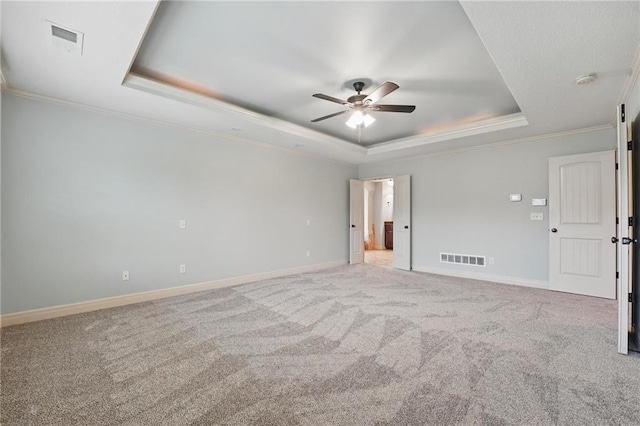 9332 W 158th St, Overland Park, KS 66221 - carpeted empty room with a raised ceiling, crown molding, and ceiling fan