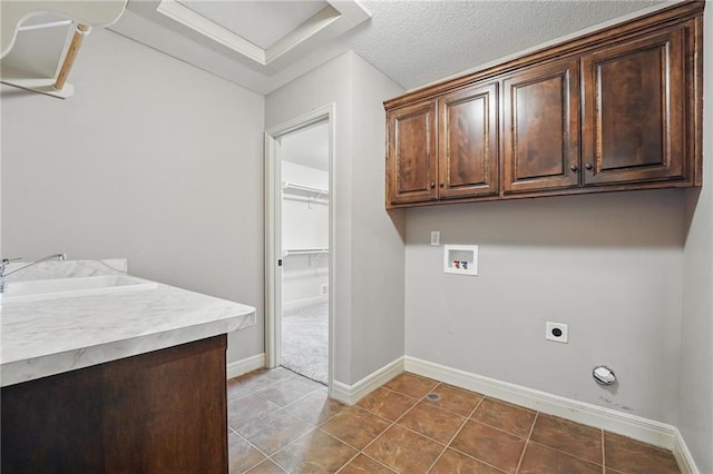 9332 W 158th St, Overland Park, KS 66221 - laundry room featuring cabinet space, washer hookup, hookup for an electric dryer, tile patterned floors, and attic access