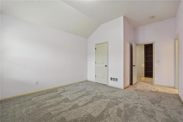 9332 W 158th St, Overland Park, KS 66221 - unfurnished bedroom featuring carpet flooring and vaulted ceiling
