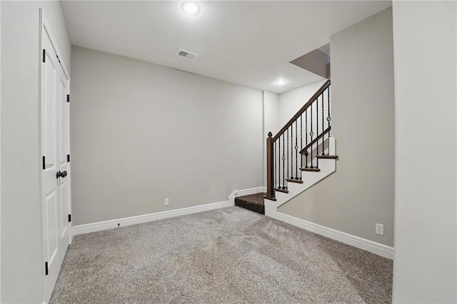 9332 W 158th St, Overland Park, KS 66221 - below grade area with carpet floors, stairway, and recessed lighting