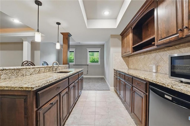 9332 W 158th St, Overland Park, KS 66221 - kitchen featuring stainless steel appliances, a raised ceiling, open shelves, tasteful backsplash, and light stone counters