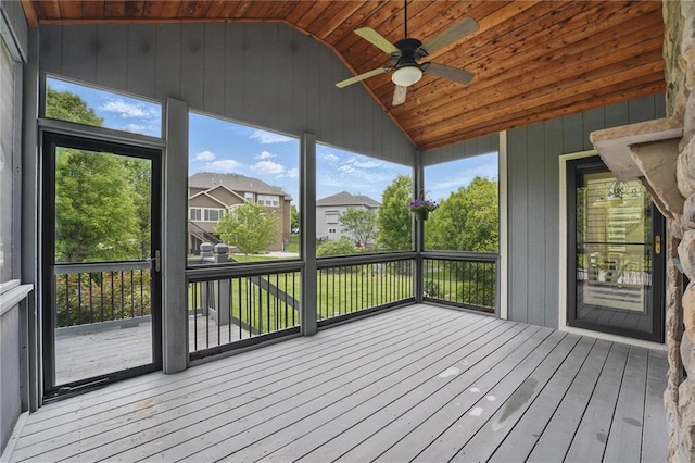 9332 W 158th St, Overland Park, KS 66221 - unfurnished sunroom with vaulted ceiling, ceiling fan, and a residential view