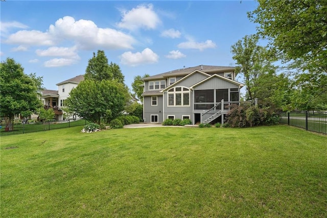 9332 W 158th St, Overland Park, KS 66221 - back of property with a sunroom, a fenced backyard, and a patio