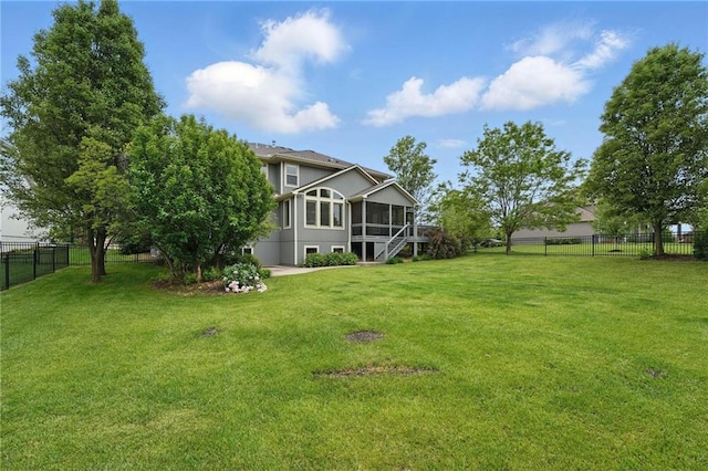 9332 W 158th St, Overland Park, KS 66221 - fenced backyard with a sunroom