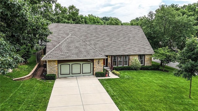 8206 Parkhill Cir, Lenexa, KS 66215 - view of front of home featuring a front lawn, a shingled roof, an attached garage, concrete driveway, and stone siding