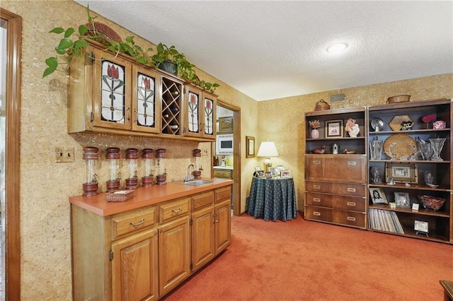 8206 Parkhill Cir, Lenexa, KS 66215 - bar area featuring white microwave, light carpet, and a textured ceiling