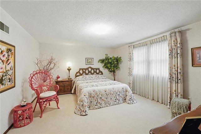 8206 Parkhill Cir, Lenexa, KS 66215 - bedroom with carpet floors and a textured ceiling