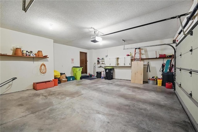8206 Parkhill Cir, Lenexa, KS 66215 - garage with a garage door opener
