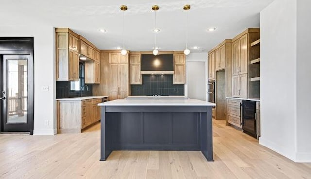 22076 W 99th Ter, Lenexa, KS 66220 - kitchen with wine cooler, backsplash, baseboards, light countertops, and recessed lighting