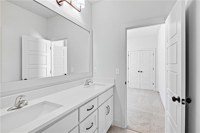 21901 W 99th Ter, Lenexa, KS 66220 - full bathroom with double vanity and baseboards