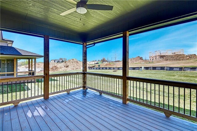 21901 W 99th Ter, Lenexa, KS 66220 - wooden terrace featuring ceiling fan and a lawn