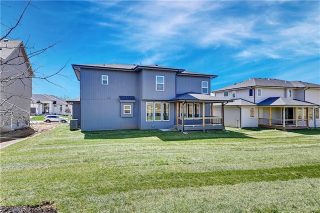 21901 W 99th Ter, Lenexa, KS 66220 - rear view of house with a lawn