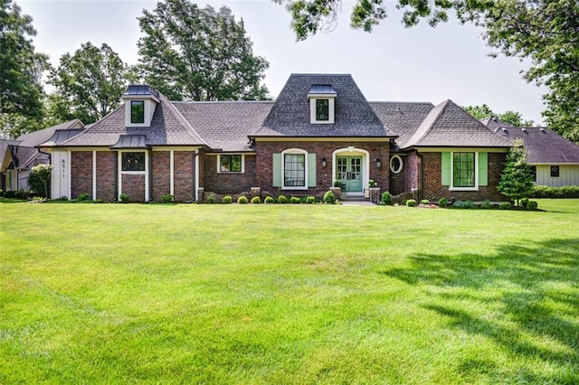 8311 Wenonga Rd, Leawood, KS 66206 - view of front of house with a front lawn, brick siding, and roof with shingles