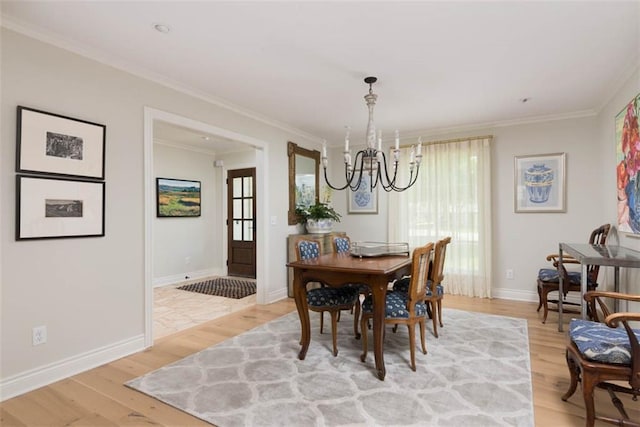 8311 Wenonga Rd, Leawood, KS 66206 - dining area with a chandelier, light wood finished floors, and ornamental molding