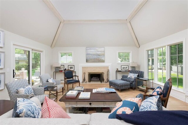 8311 Wenonga Rd, Leawood, KS 66206 - living room with beamed ceiling, a fireplace, wood finished floors, and high vaulted ceiling