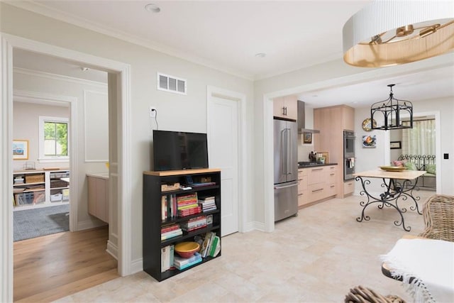 8311 Wenonga Rd, Leawood, KS 66206 - living room featuring a chandelier and crown molding