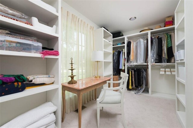 8311 Wenonga Rd, Leawood, KS 66206 - walk in closet featuring carpet floors