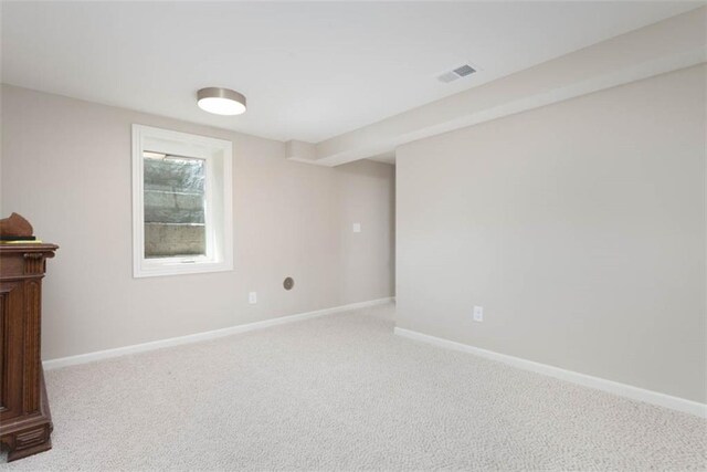 8311 Wenonga Rd, Leawood, KS 66206 - carpeted empty room with baseboards
