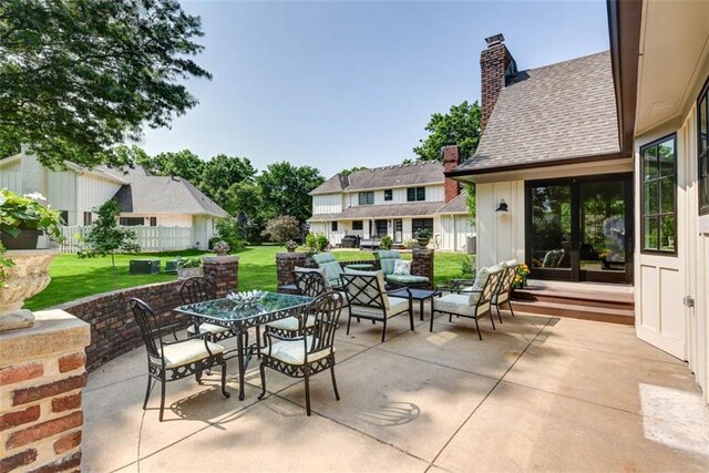 8311 Wenonga Rd, Leawood, KS 66206 - view of patio / terrace with french doors and outdoor dining space