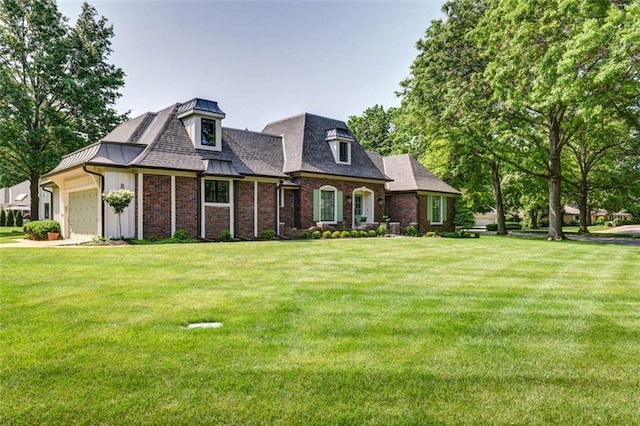 8311 Wenonga Rd, Leawood, KS 66206 - view of front of home featuring a front lawn, an attached garage, a standing seam roof, and brick siding