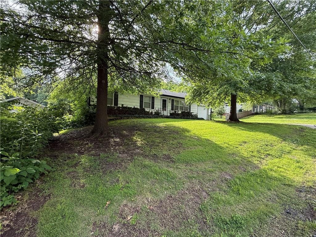 6310 River Rd, Pleasant Valley, MO 64068 - view of green lawn