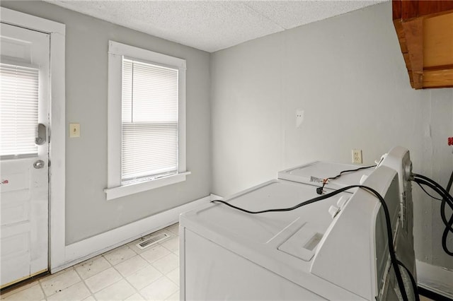 800 Brown Ave, Osawatomie, KS 66064 - washroom featuring healthy amount of natural light and a textured ceiling
