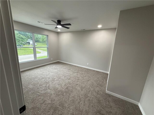 1141 Walnut Ave, Osawatomie, KS 66064 - carpeted spare room with baseboards, ceiling fan, and recessed lighting