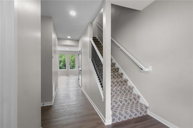 1141 Walnut Ave, Osawatomie, KS 66064 - stairway featuring wood finished floors and recessed lighting