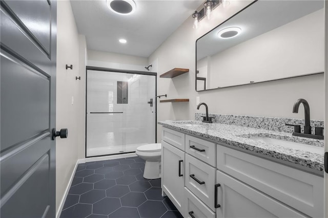 1141 Walnut Ave, Osawatomie, KS 66064 - full bathroom featuring double vanity, a shower stall, tile patterned floors, and recessed lighting