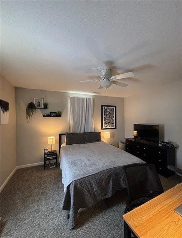 501 W Mcpherson St, Knob Noster, MO 65336 - bedroom with baseboards, carpet, an office area, ceiling fan, and a textured ceiling