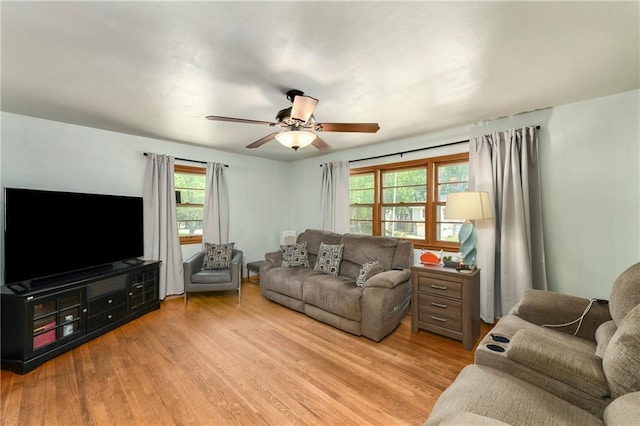 4820 Stearns Ln, Shawnee, KS 66203 - living room with plenty of natural light, light wood finished floors, and ceiling fan