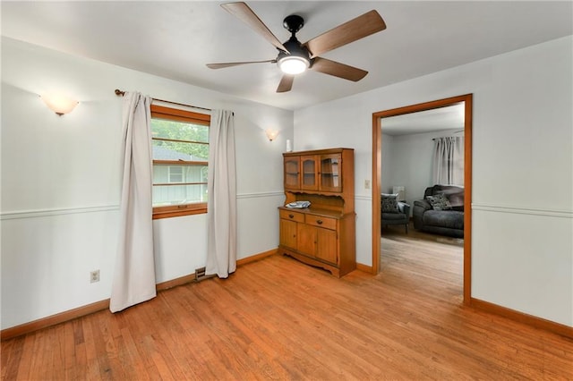 4820 Stearns Ln, Shawnee, KS 66203 - spare room featuring light wood-type flooring and a ceiling fan